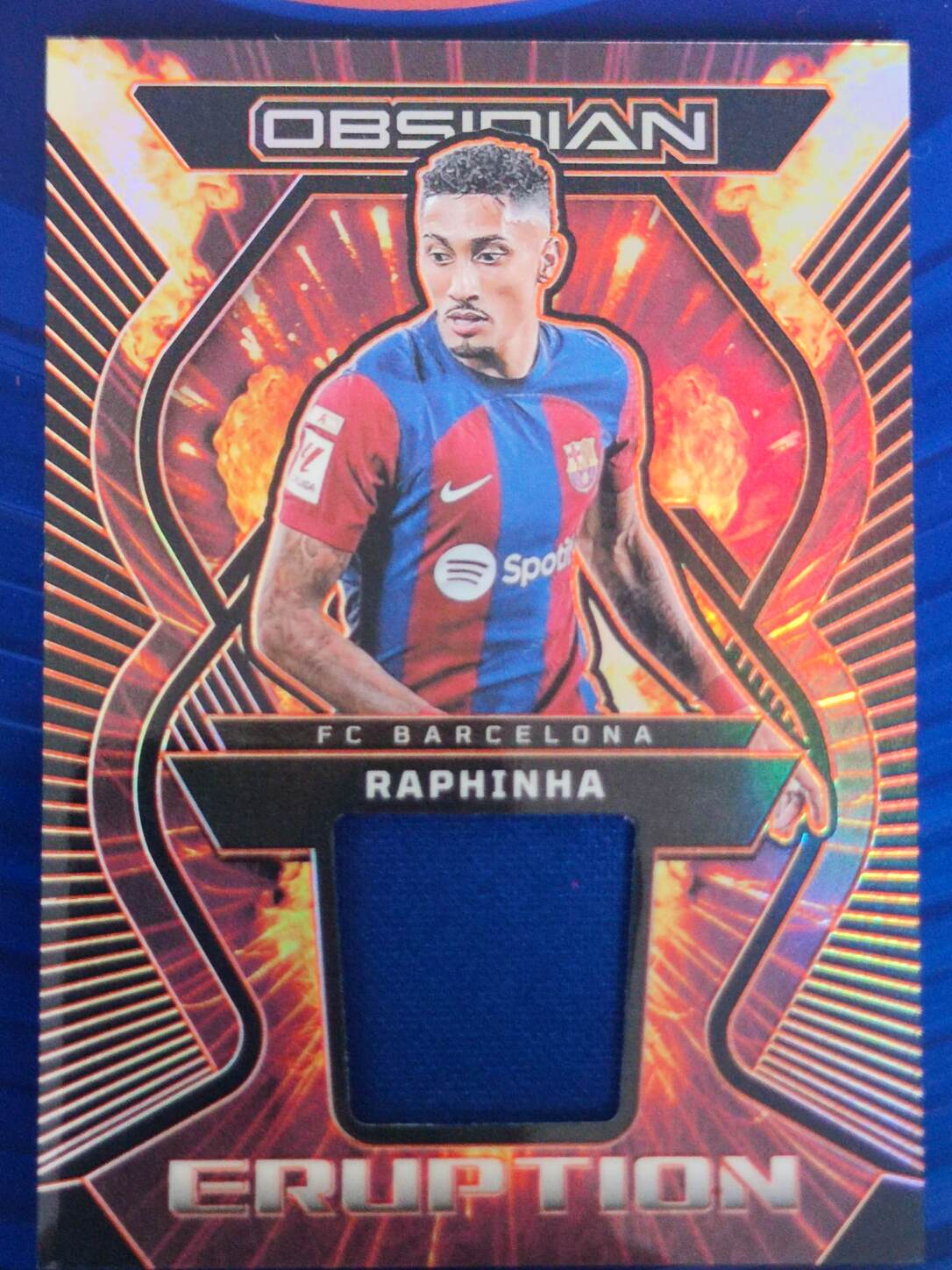 PANINI OBSIDIAN 2023/2024 RAPHINHA ERUPTION PARCHE NºER-R NUMERADO /99